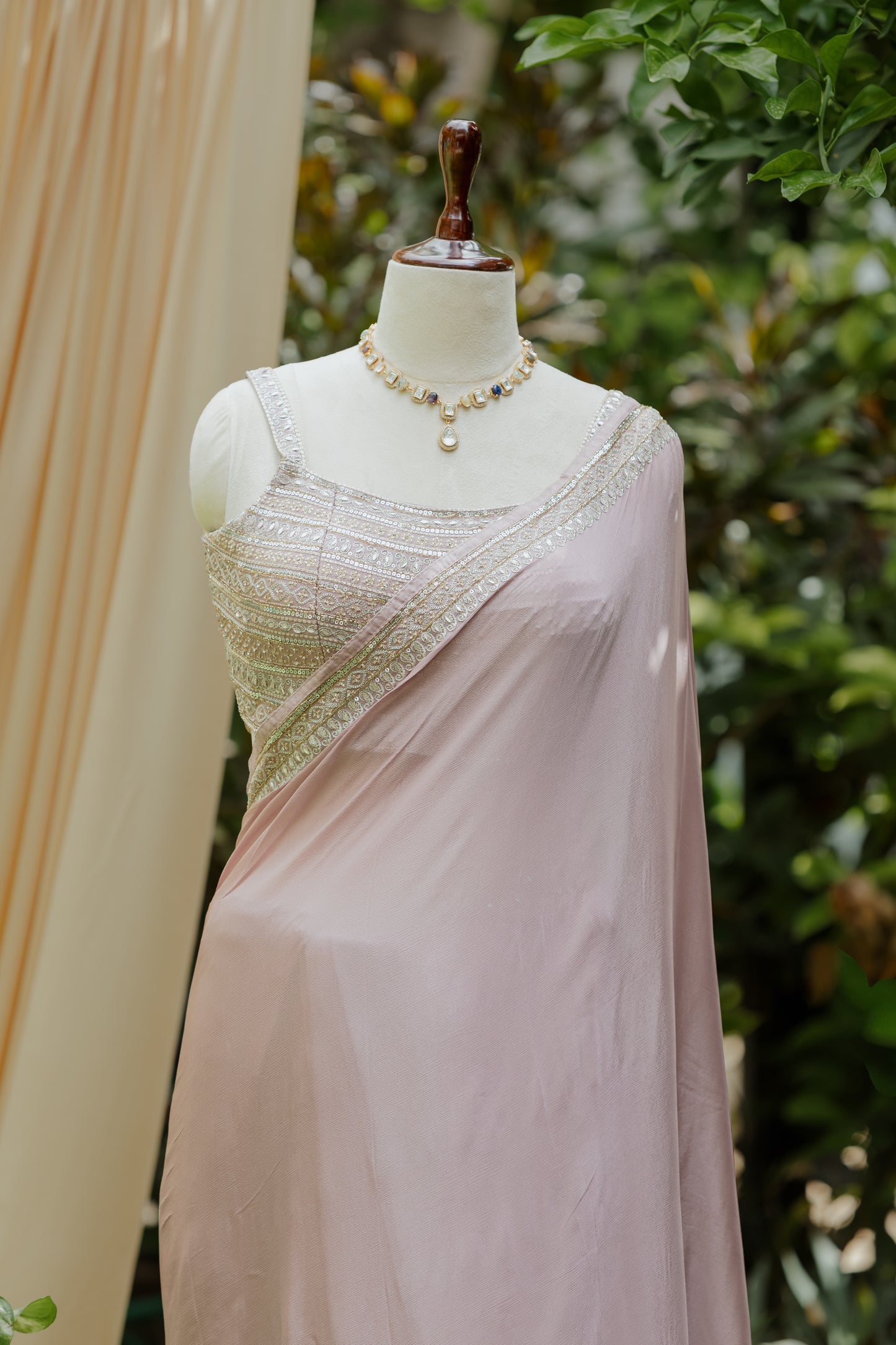 Lavender saree with embroidered blouse