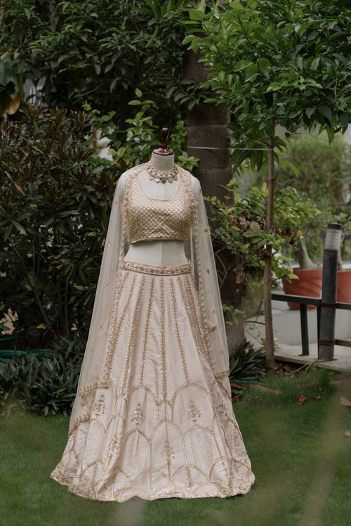 Ivory gold jacket and lehenga set