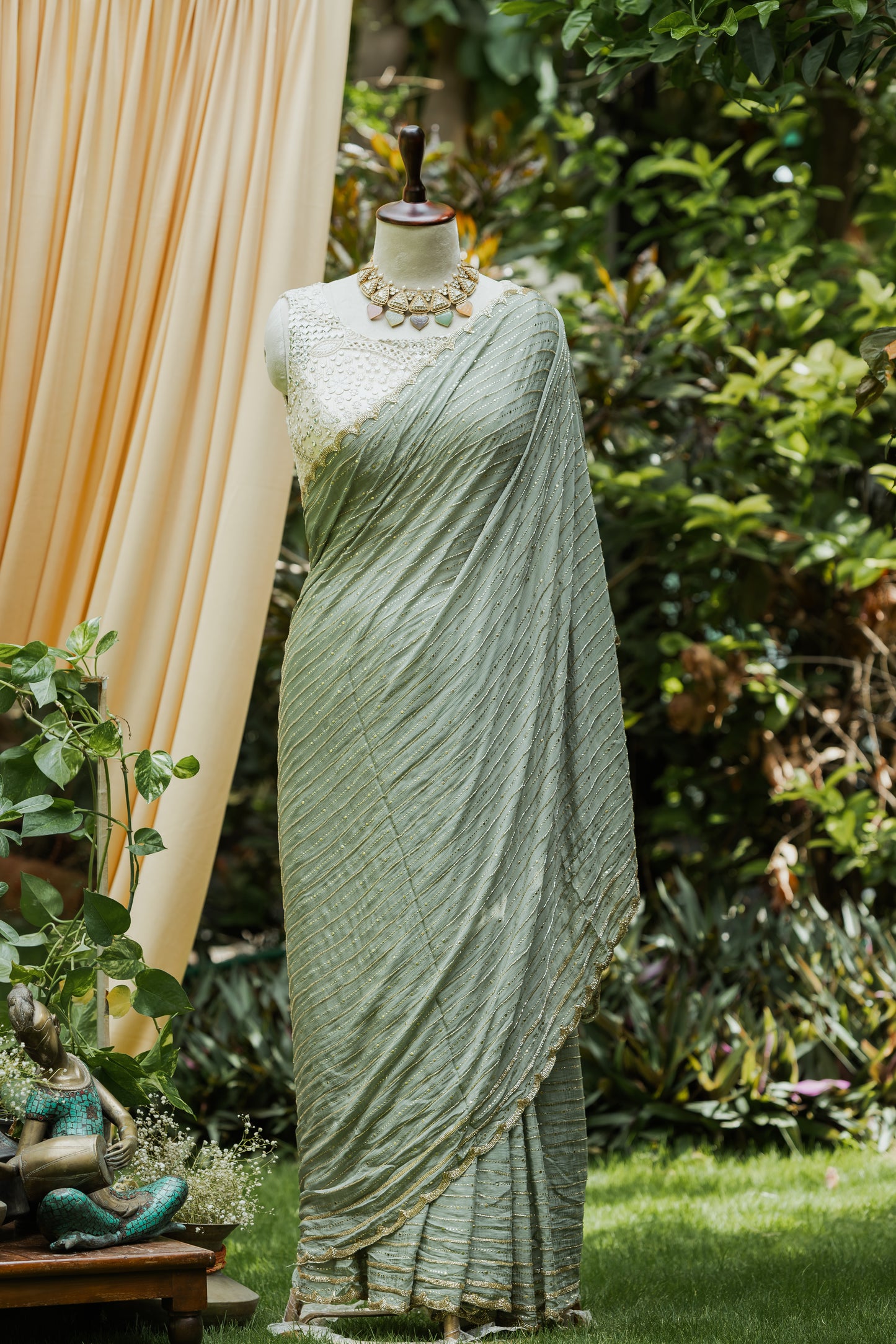 Sage green pipe work saree with matching blousepiece