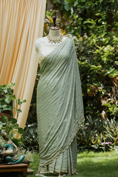 Sage green pipe work saree with matching blousepiece