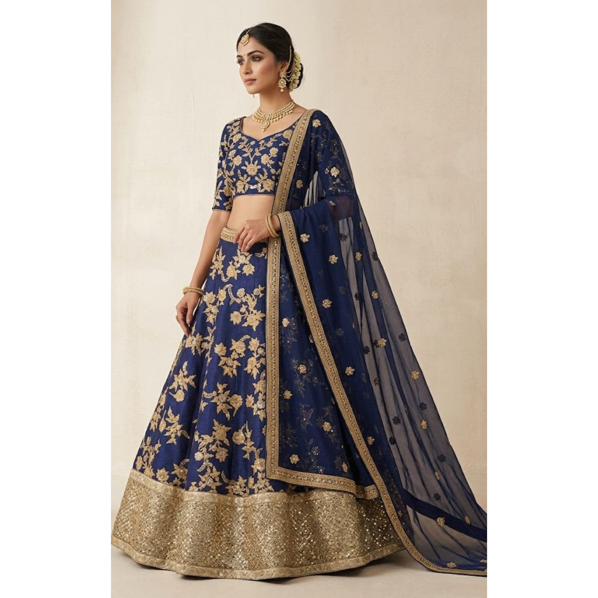 Woman wearing a blue and gold embroidered traditional outfit on a beige background